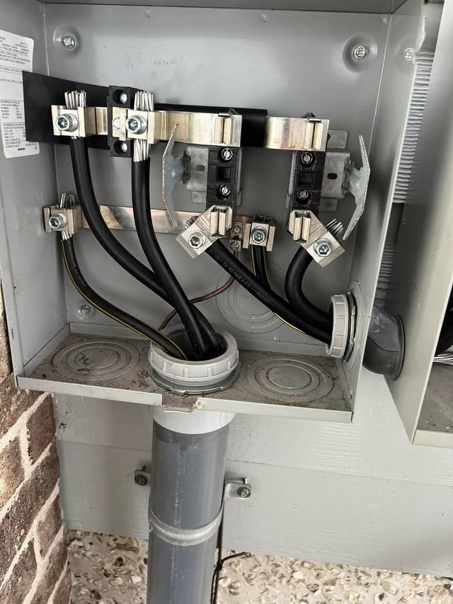 Service entrance conductors landed in a meter cabinet
