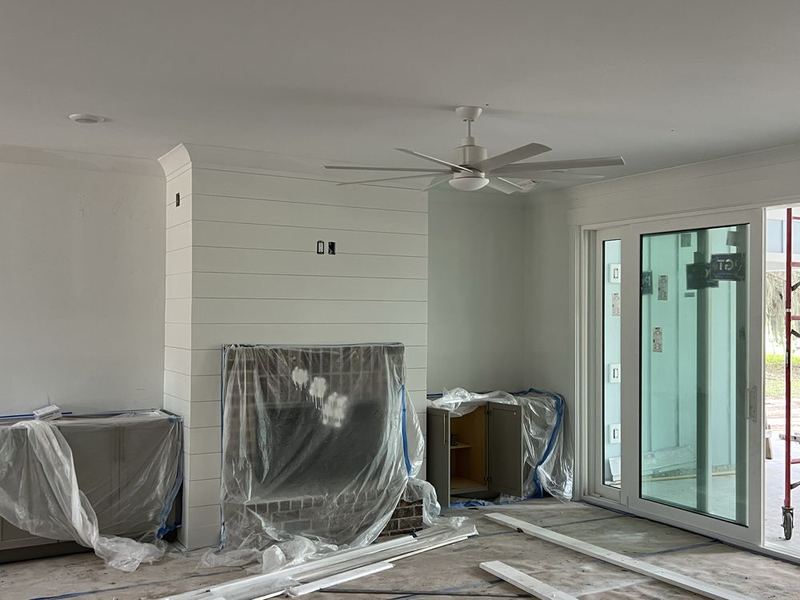 Finished room with a new ceiling fan installed