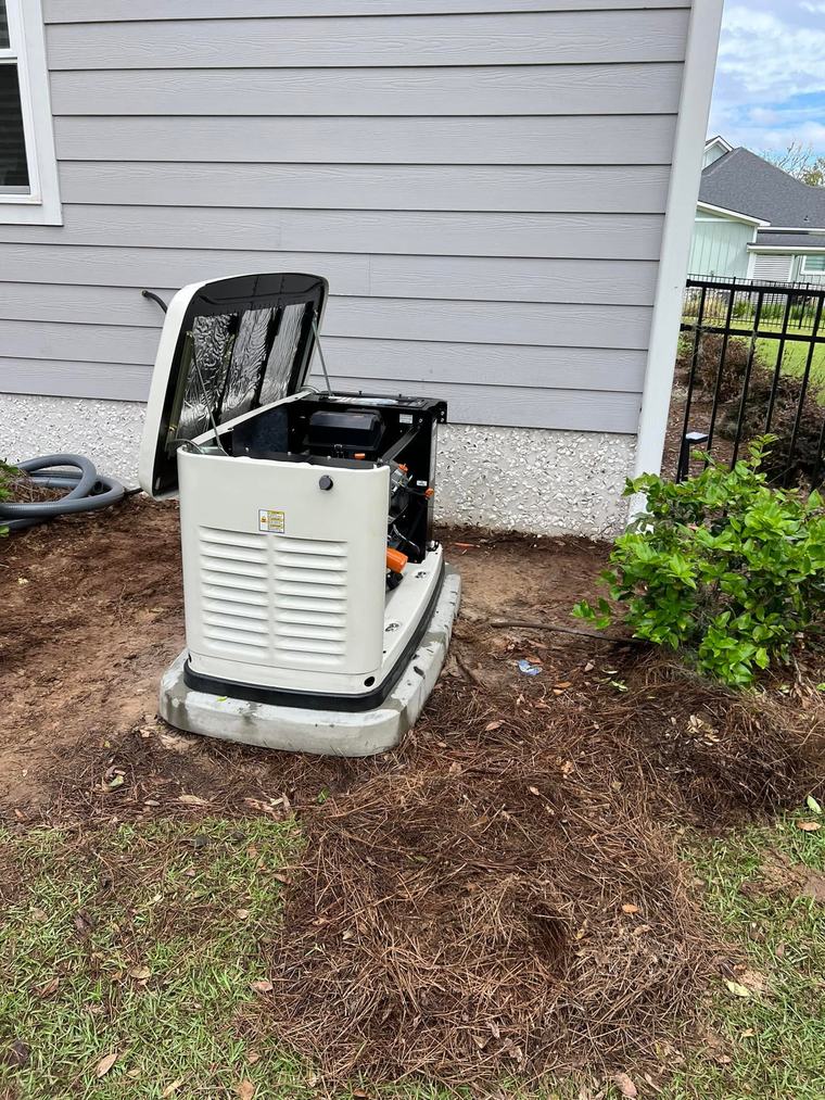 Standby generator with the lid open during a service call