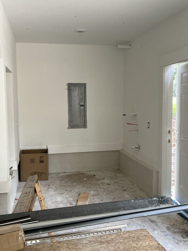Panel set on the wall of an unfinished room